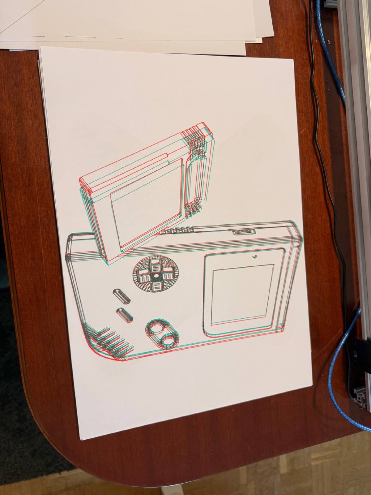 Game Boy wireframe drawn in red and green ink, creating an anaglyph 3D effect.