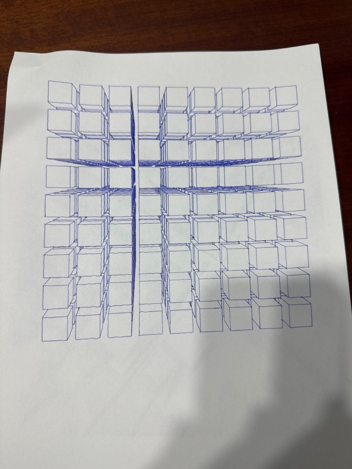 Grid of isometric cubes with varying heights, drawn in blue ink.